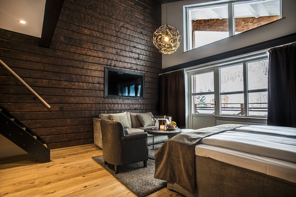 Junior Suite (Incl. Spa Access) | Desk, laptop workspace, blackout drapes, iron/ironing board