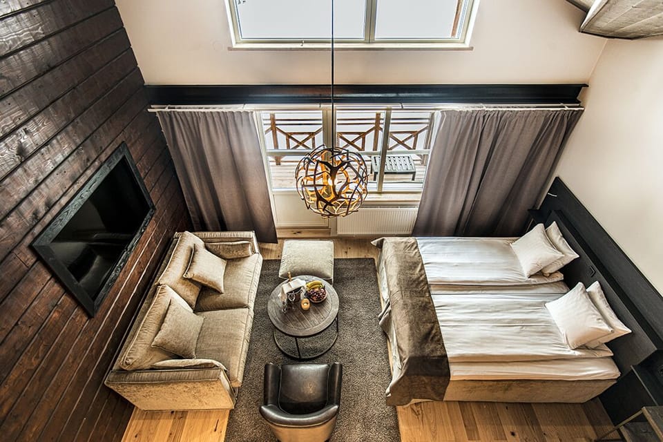 Junior Suite (Incl. Spa Access) | Desk, laptop workspace, blackout drapes, iron/ironing board