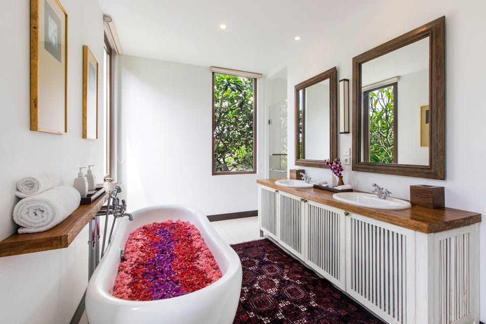 Bathrobes, slippers, bidet, towels