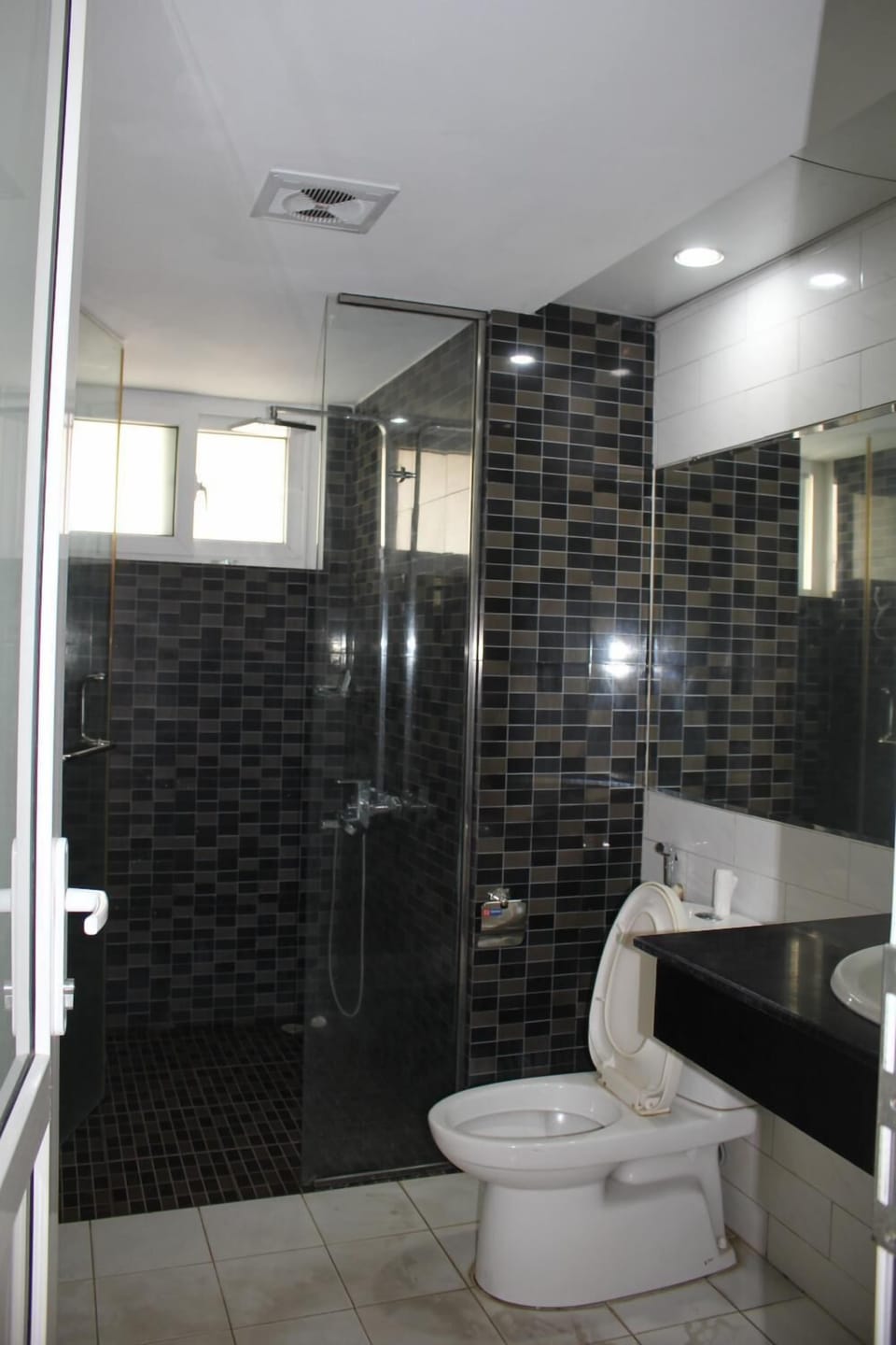 Shower, free toiletries, hair dryer, slippers