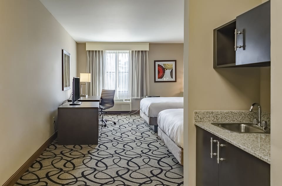 Room, 2 Queen Beds | In-room safe, individually decorated, individually furnished, desk