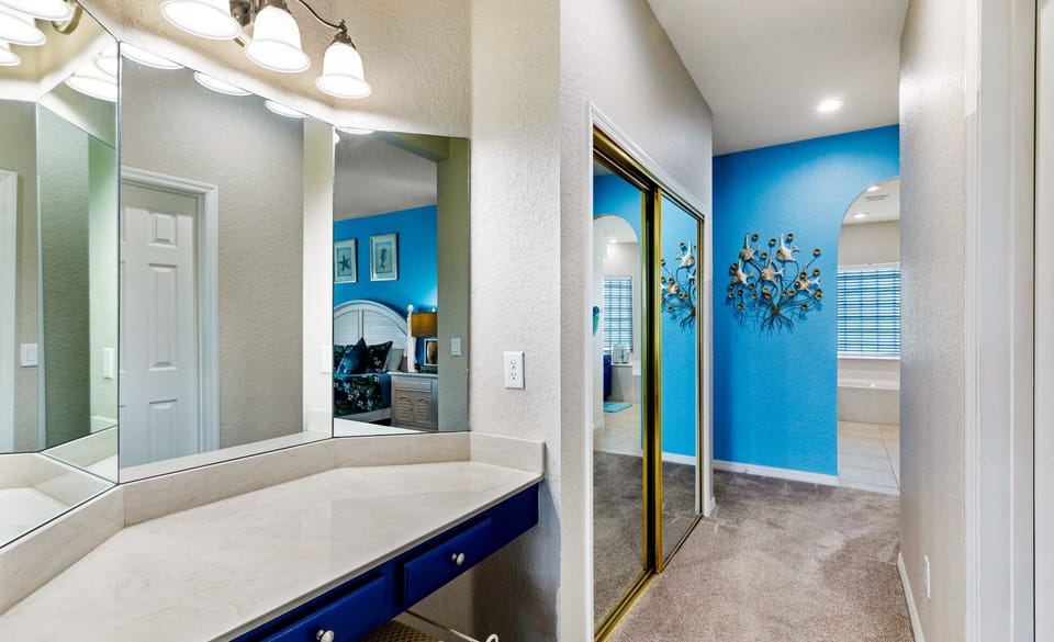 Vanity area of Master suite with walk in closet and plenty of storage. (safe) 