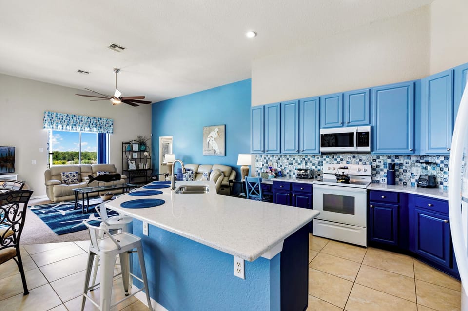 fully equipped kitchen with quartz worktops.