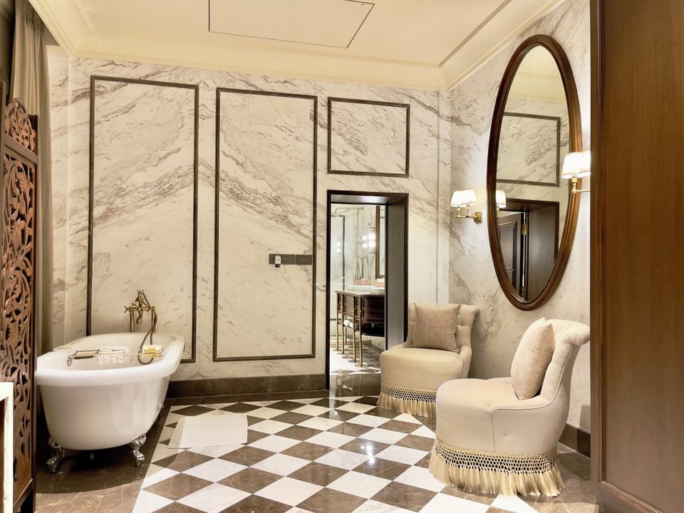 Presidential Suite, 2 Bedrooms | Bathroom | Shower, free toiletries, hair dryer, slippers