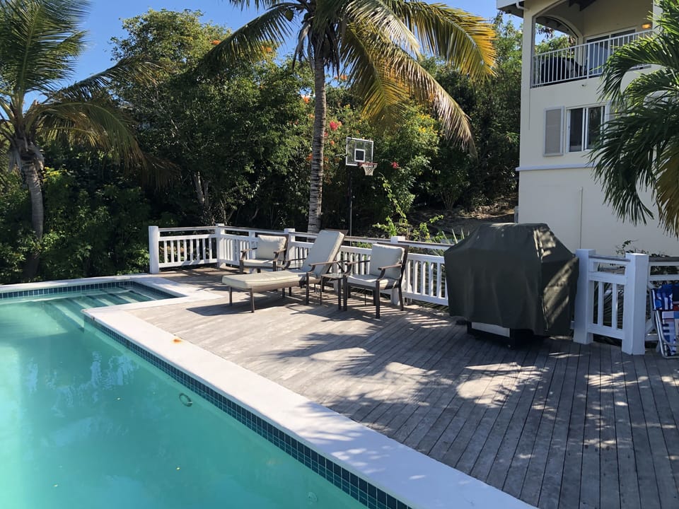 Pool and deck with Kitchen Aid grill. 