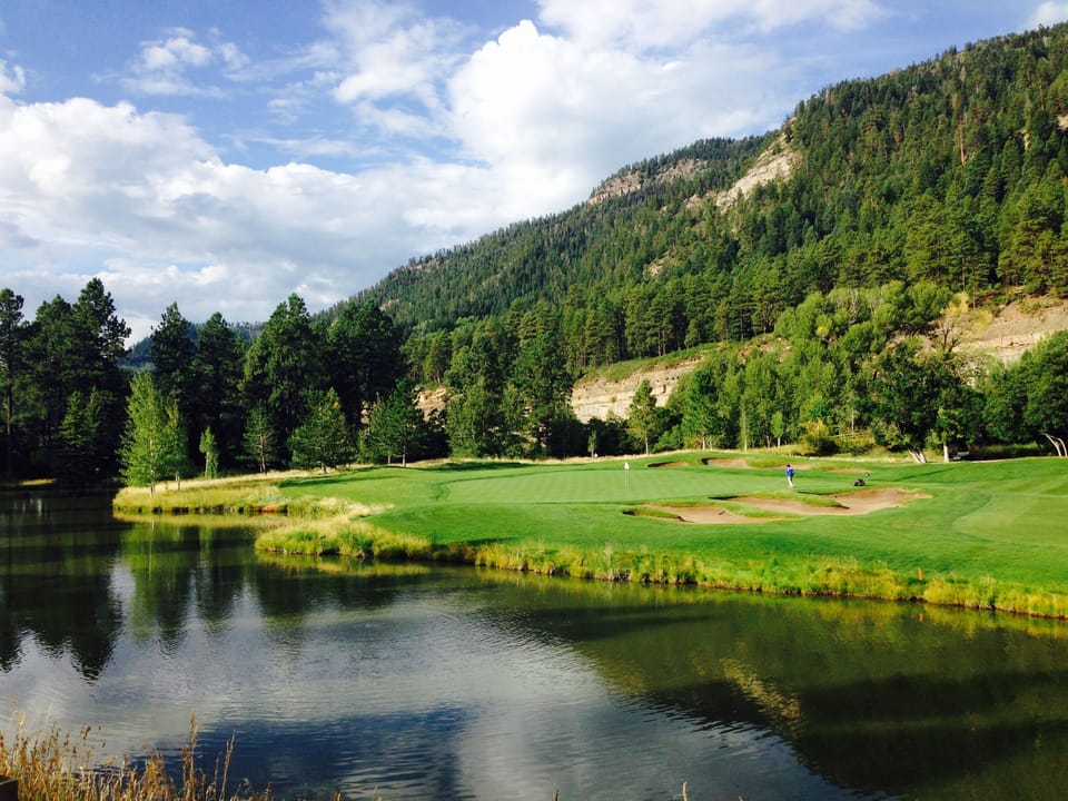 Studio Condo Rental in Durango, CO - View of the golf course at Glacier Club. Condo rental in Durango, CO. Studio condo with golf course and mountain views.