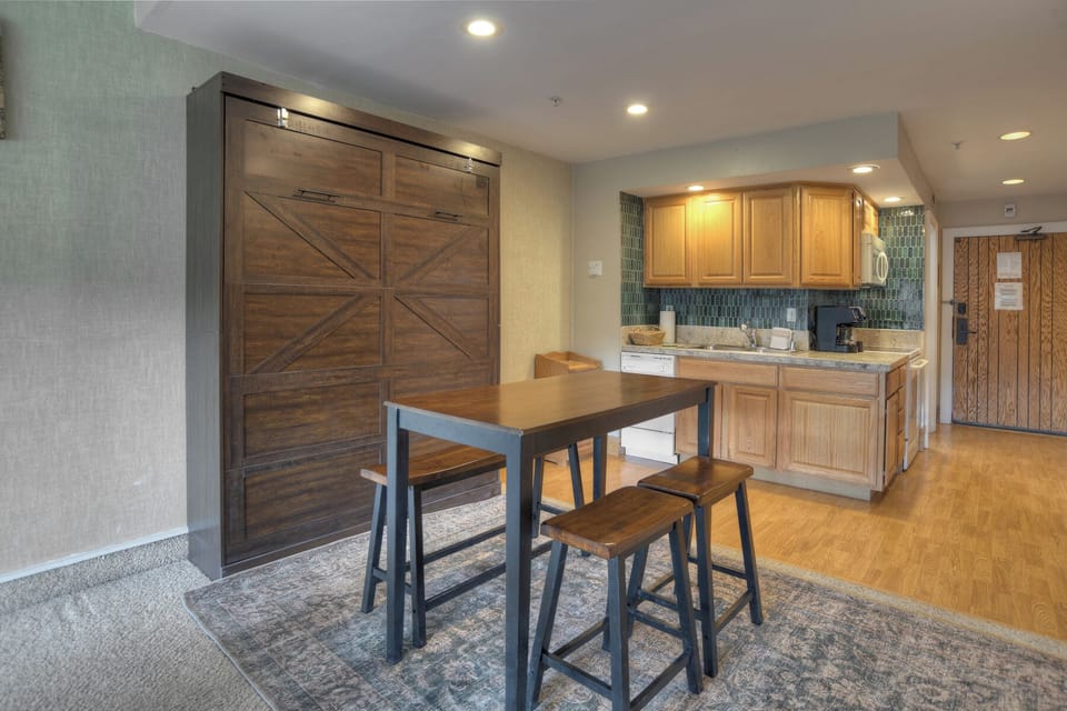 Dining Area and Queen Murphy Bed