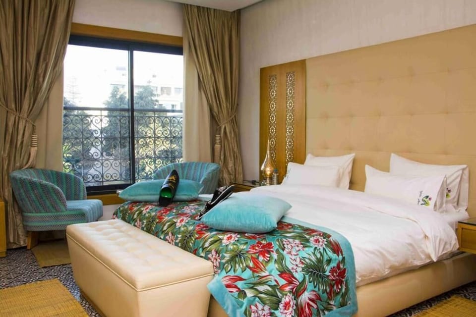 Egyptian cotton sheets, premium bedding, down comforters, free minibar