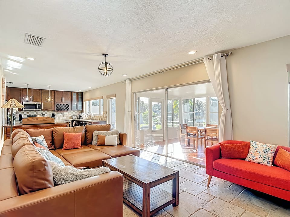 Living room, lanai and kitchen