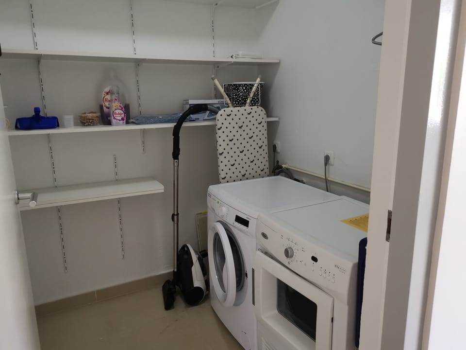 laundry room with washing machine and dryer
