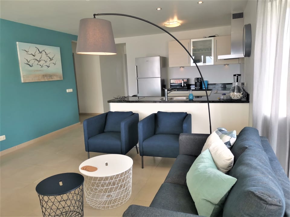 spacious living room with open kitchen