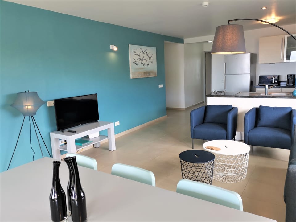 spacious living room with open kitchen