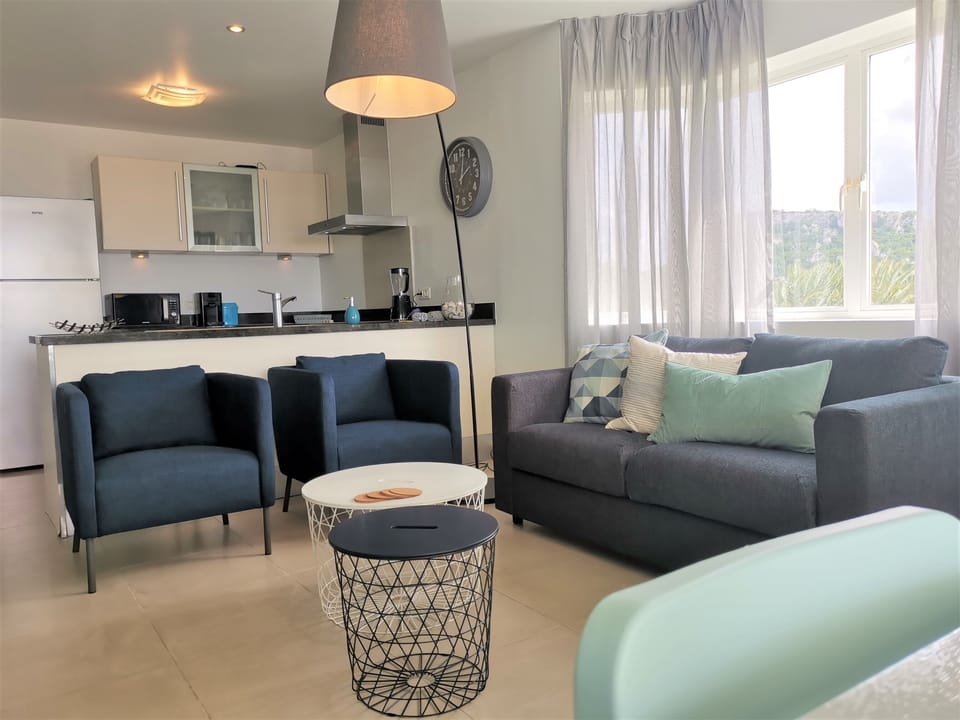 spacious living room with open kitchen