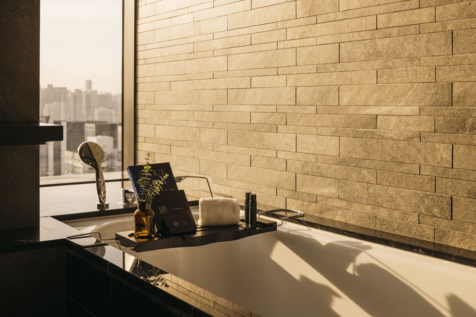 Designer toiletries, hair dryer, bathrobes, slippers