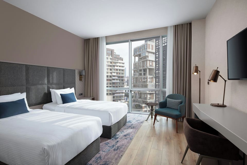 Superior Room, 2 Twin Beds | Minibar, in-room safe, desk, laptop workspace