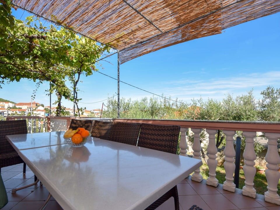 Table, Furniture, Sky, Property, Tableware, Chair, Shade, Outdoor Furniture, Tree, Outdoor Table