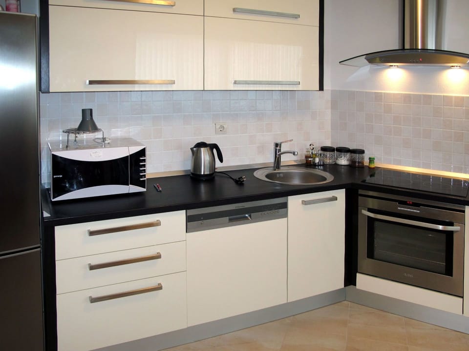 Countertop, Cabinetry, Kitchen, Furniture, Room, Kitchen Stove, Major Appliance, Property, Kitchen Appliance, Home Appliance