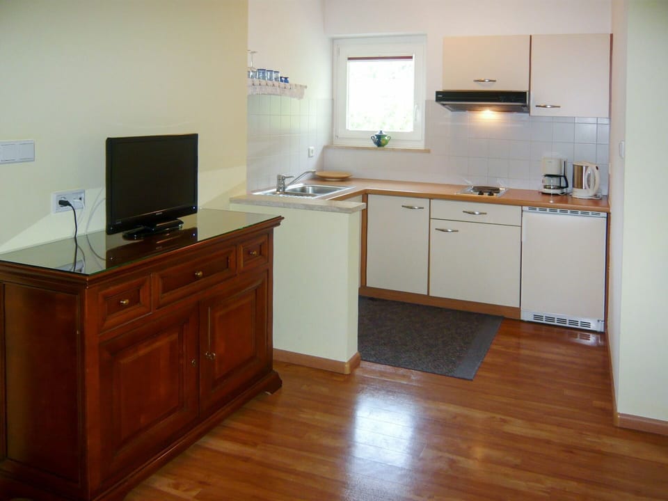 Cabinetry, Building, Furniture, Countertop, Drawer, Wood, Kitchen Stove, Sink, Kitchen Appliance, Flooring