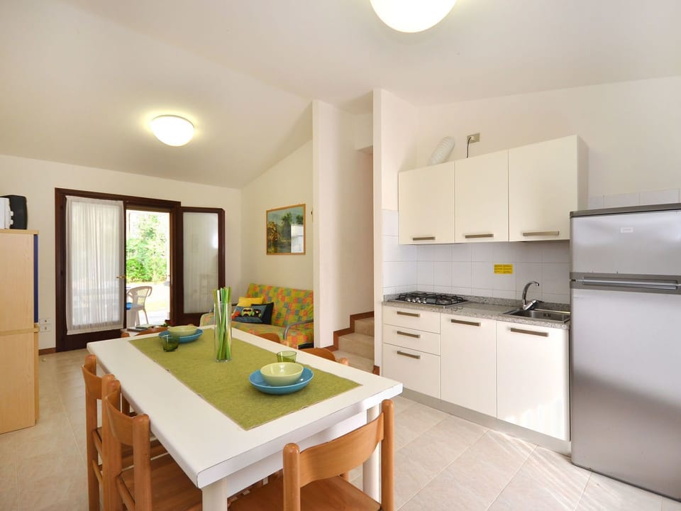 Property, Room, Furniture, Interior Design, Building, Kitchen, House, Yellow, Cabinetry, Real Estate