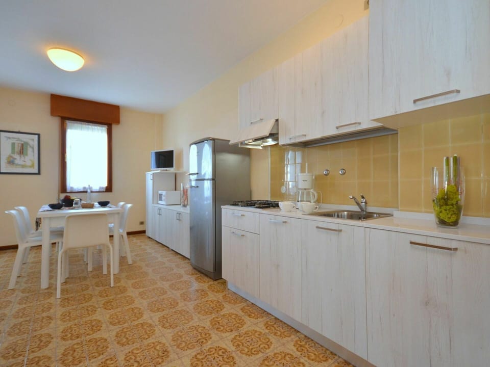 Countertop, Cabinetry, Tap, Furniture, Sink, Building, Kitchen Sink, Kitchen, Houseplant, Wood