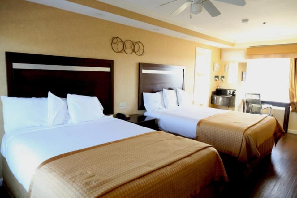 Pillowtop beds, desk, laptop workspace, blackout drapes