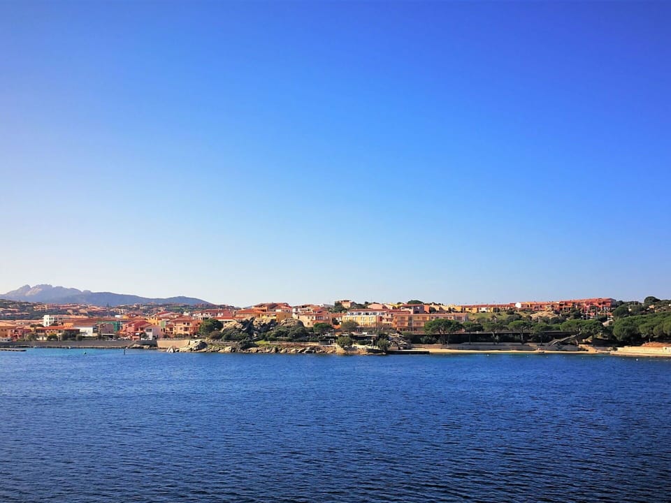 Water, Sky, Water Resources, Building, Cloud, Azure, Natural Landscape, Lake, Coastal And Oceanic Landforms, Bank
