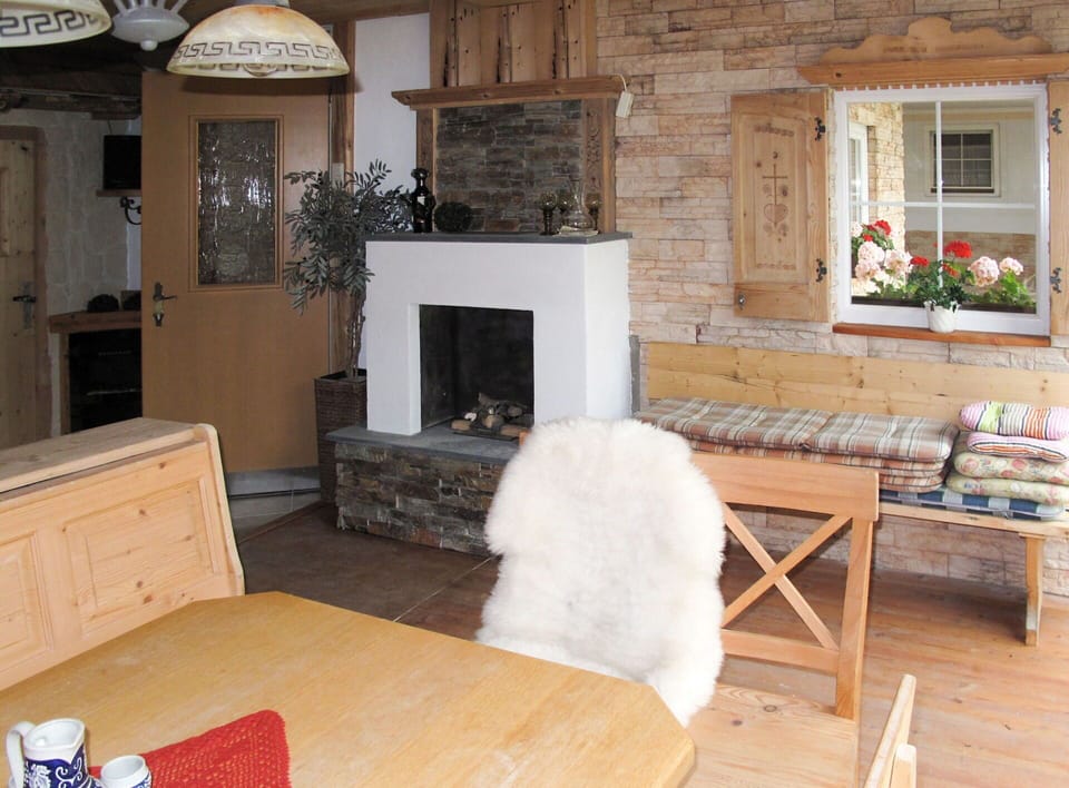 Room, Property, Living Room, Furniture, Hearth, Fireplace, House, Building, Interior Design, Home
