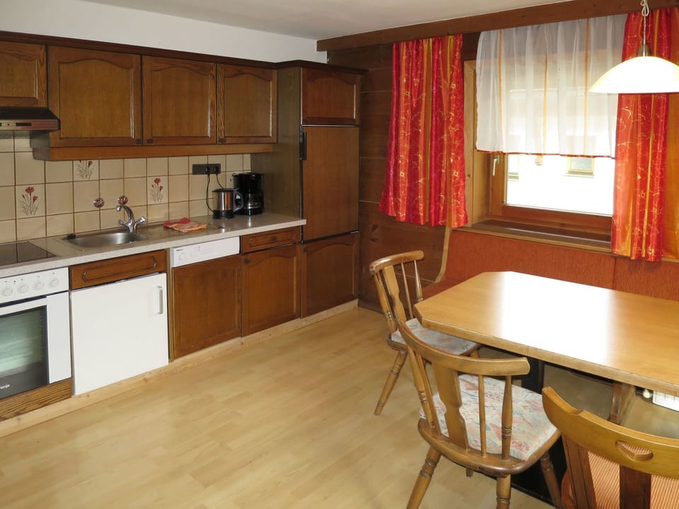 Room, Furniture, Countertop, Kitchen, Property, Cabinetry, Interior Design, Building, Floor, Hardwood