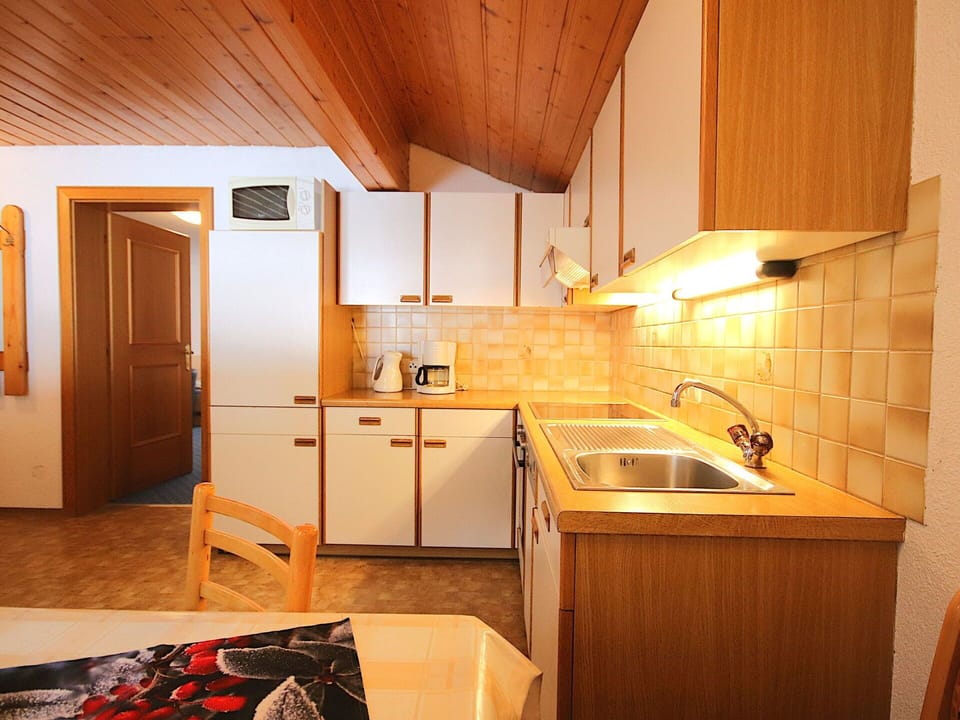 Wood, Interior Design, Ceiling, Countertop, Kitchen, Room, Wood Stain, Cabinetry, Hardwood, Sink