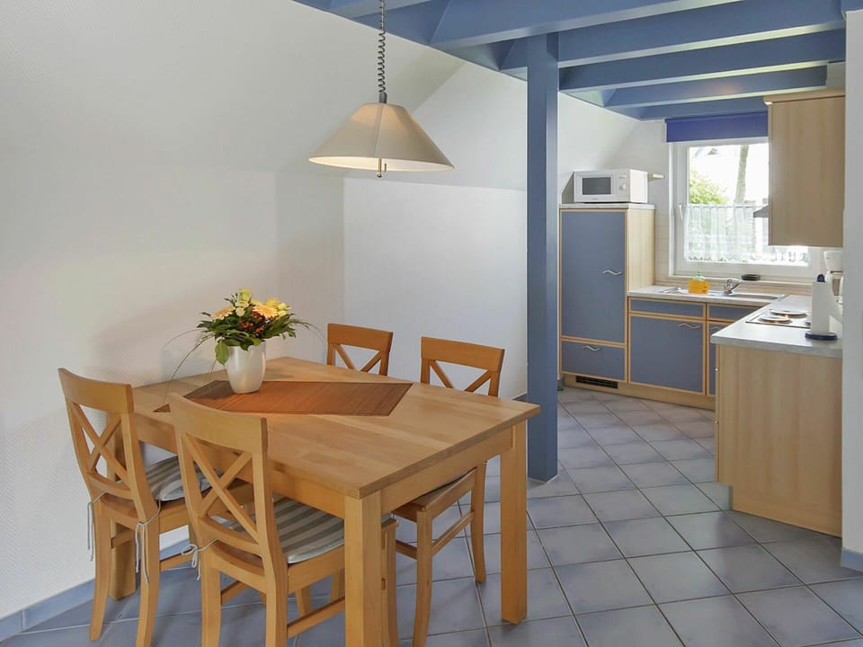 Table, Furniture, Property, Cabinetry, Chair, Building, Flower, Wood, Lighting, Interior Design