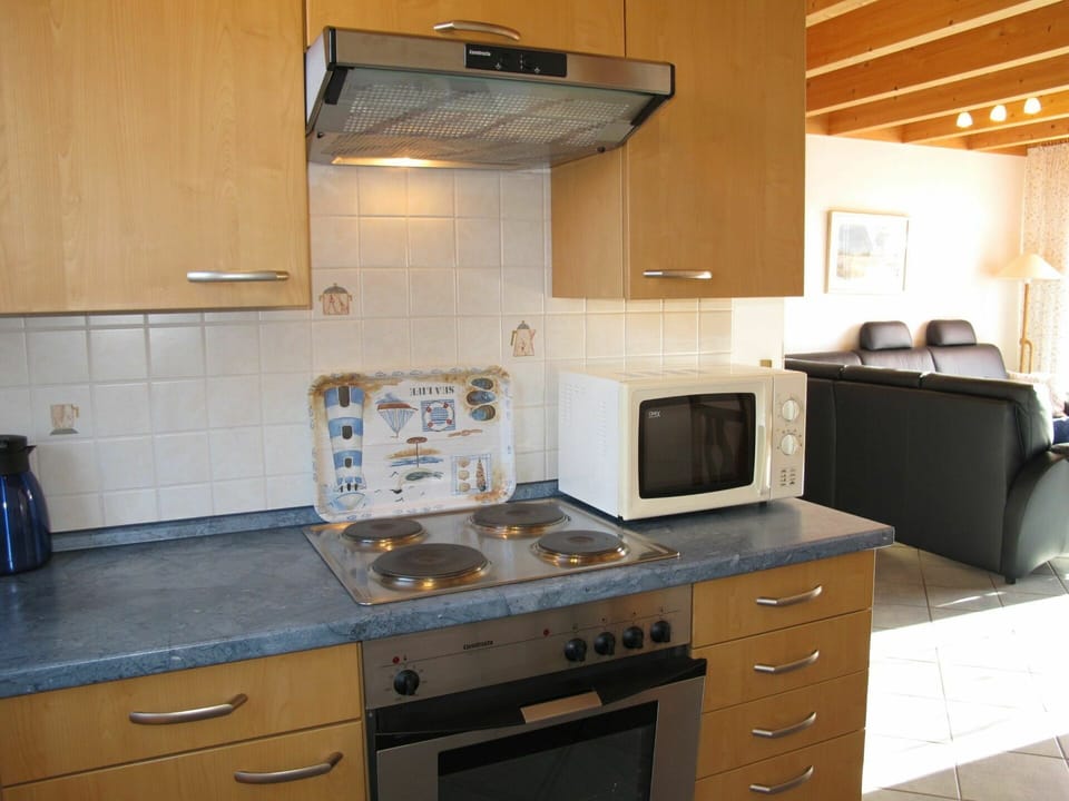 Countertop, Cabinetry, Property, Furniture, Kitchen Appliance, Kitchen Stove, Drawer, Kitchen, Building, Home Appliance