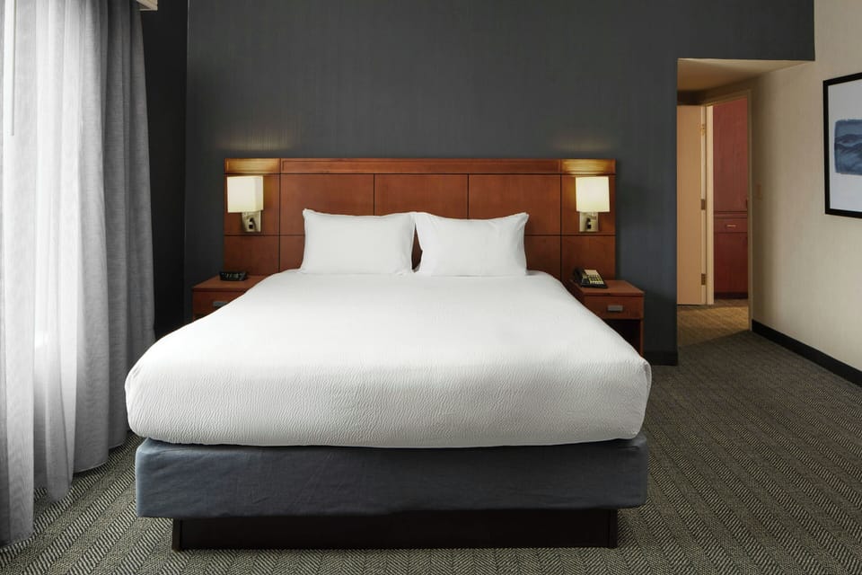 Suite, 1 King Bed with Sofa bed | Down comforters, desk, iron/ironing board, free cribs/infant beds