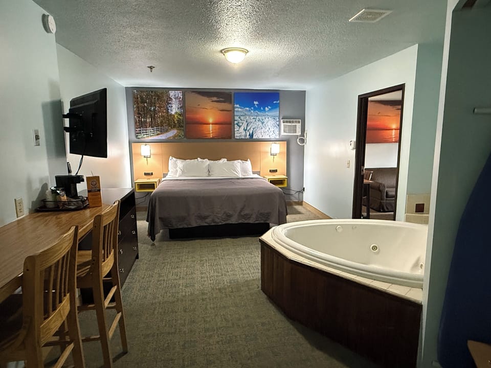 Deluxe Room, 1 King Bed (No Pets Allowed) | Desk, iron/ironing board, free WiFi, bed sheets
