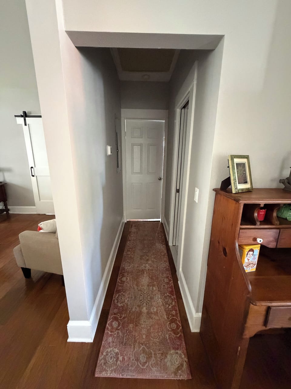 Hallway to 2nd bedroom and 2nd full bath