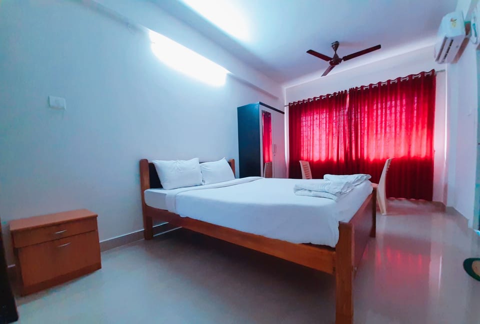 Deluxe Double Room | In-room safe, blackout drapes, iron/ironing board, cribs/infant beds