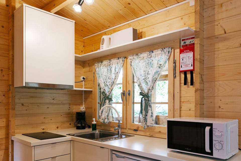 Premium Villa | Private kitchen | Stovetop, electric kettle, cookware/dishes/utensils