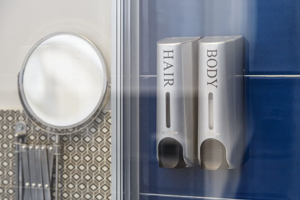 Standard Double Room (Spade) | Bathroom | Shower, hair dryer, slippers, bidet