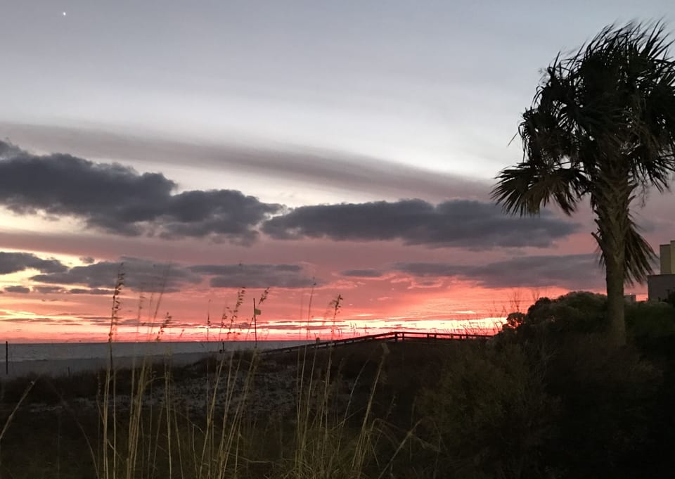 Watch Coral Sunsets from your beach chair!