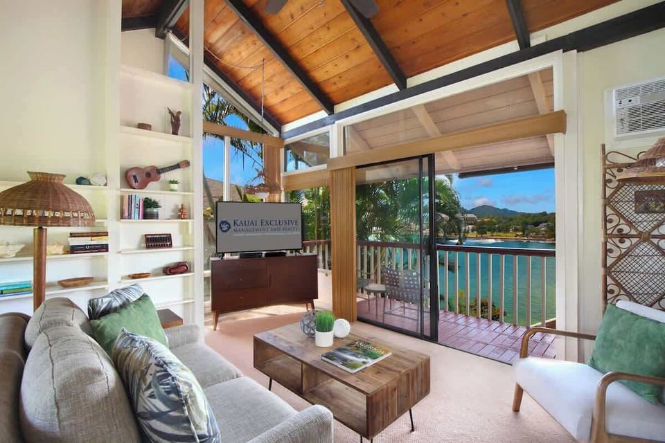Relax in the spacious, living area with vaulted ceiling and stunning views!