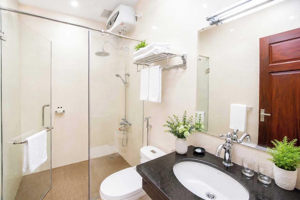 Shower, free toiletries, hair dryer, slippers