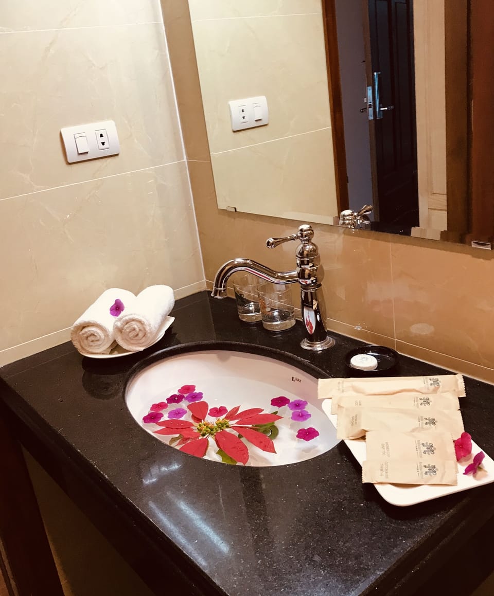 Shower, free toiletries, hair dryer, slippers