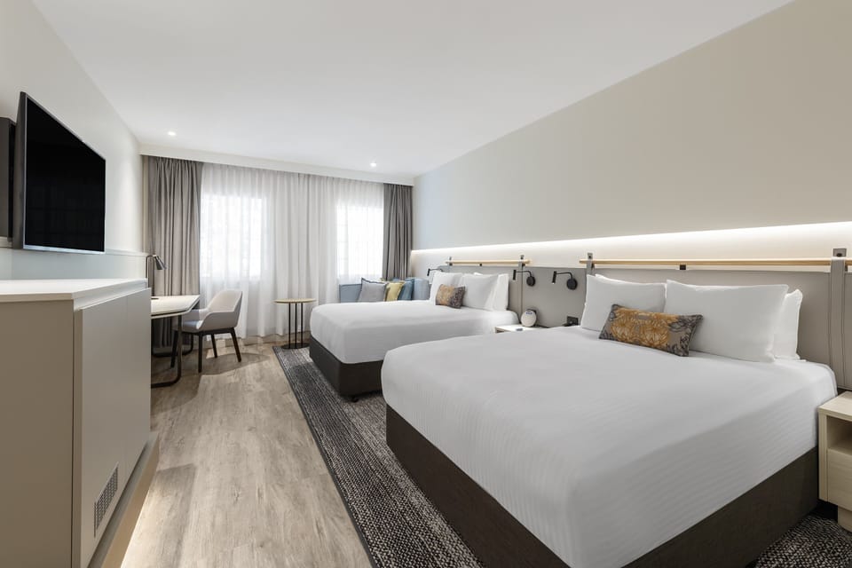 Premium Room, 2 Queen Beds | Premium bedding, in-room safe, desk, iron/ironing board