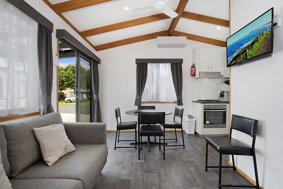 Family Cabin, 2 Bedrooms | Living area | 32-inch LCD TV with digital channels, TV, DVD player