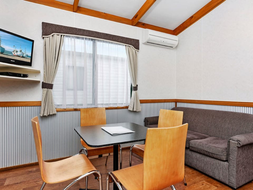 Deluxe One Bedroom Cabin | Premium bedding, down comforters, desk, iron/ironing board