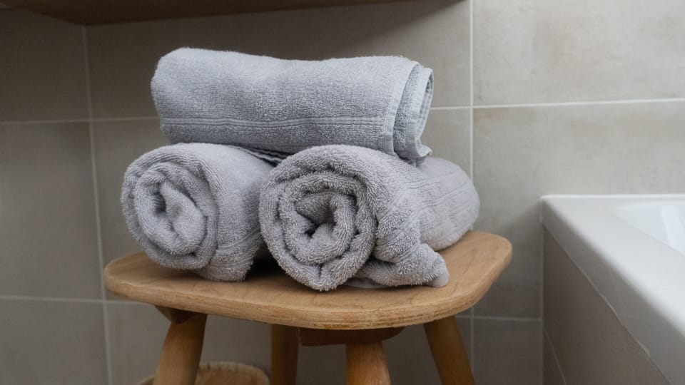 Deep soaking tub, hair dryer, bidet, heated floors