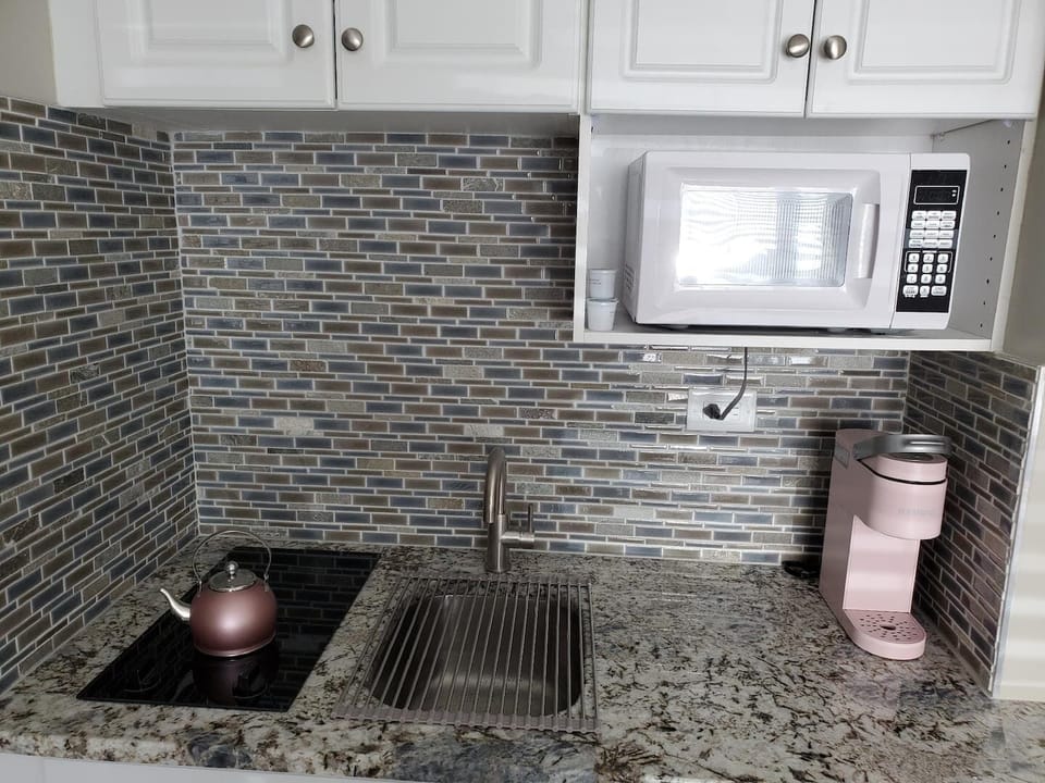 Kitchenette.  has micro, coffee maker, toaster, 2 burner stove, fridge. Air Fryer (no oven)