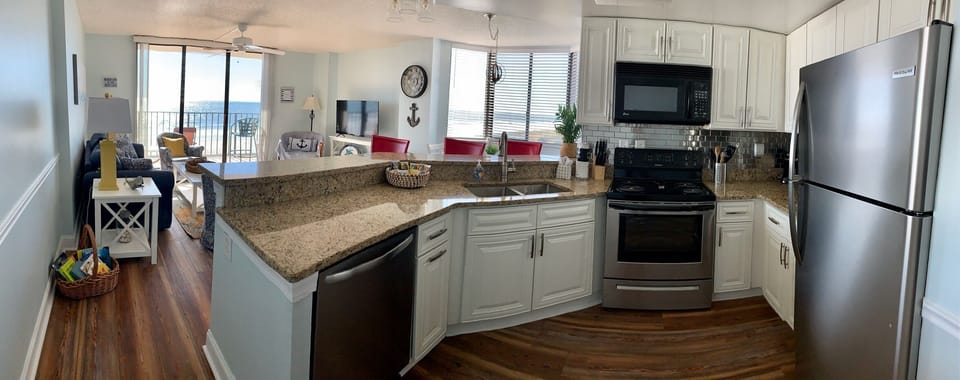 Updated kitchen with new cabinets, appliances, counters & all the essentials!