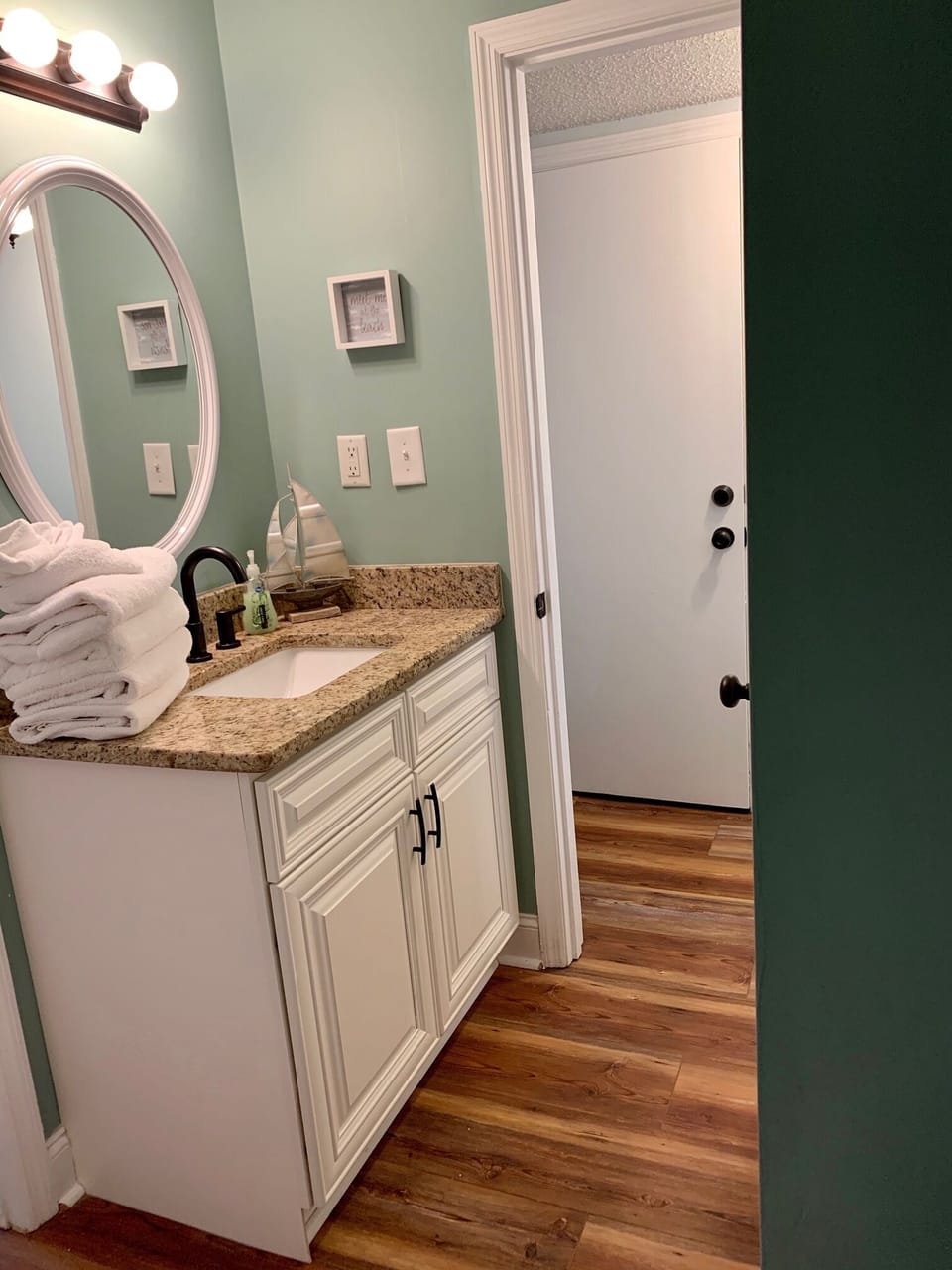 Updated Full bath with new sink, counters & cabinets with plenty of storage