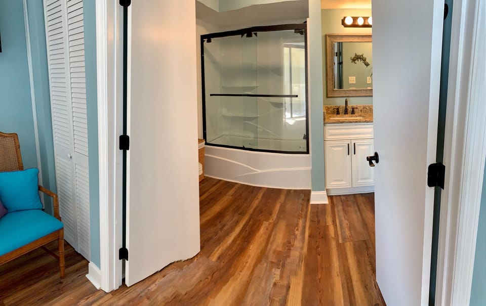Renovated Spacious Primary Bathroom with new tub/shower & 2 New Sinks