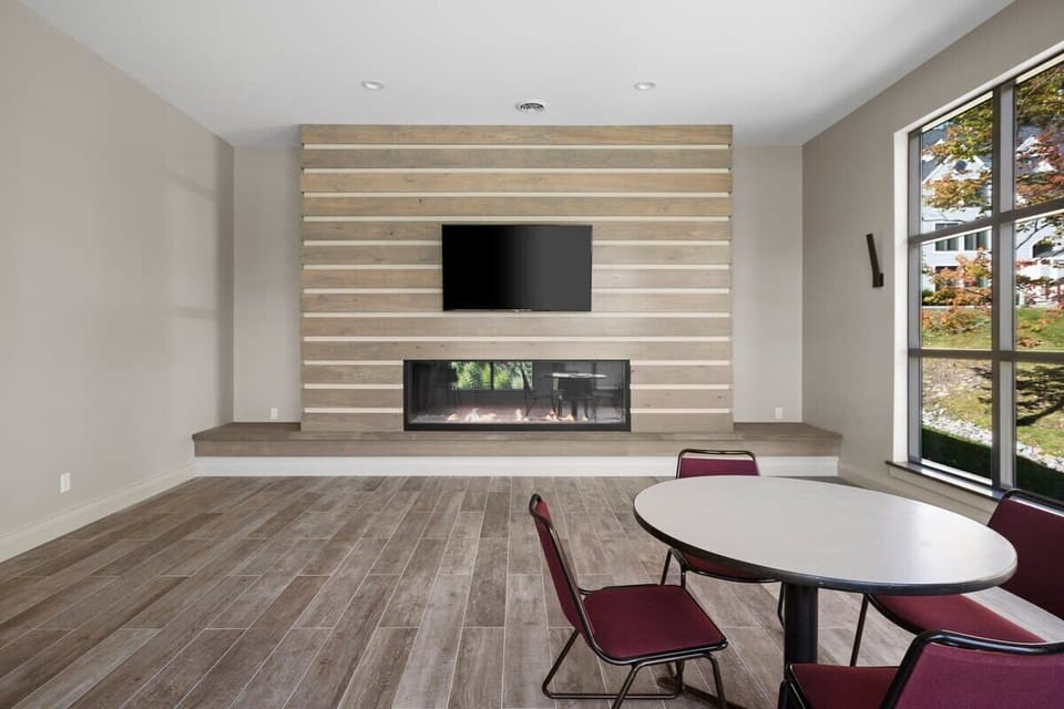 Brand new for 2021! Fireplace lounge with TV.